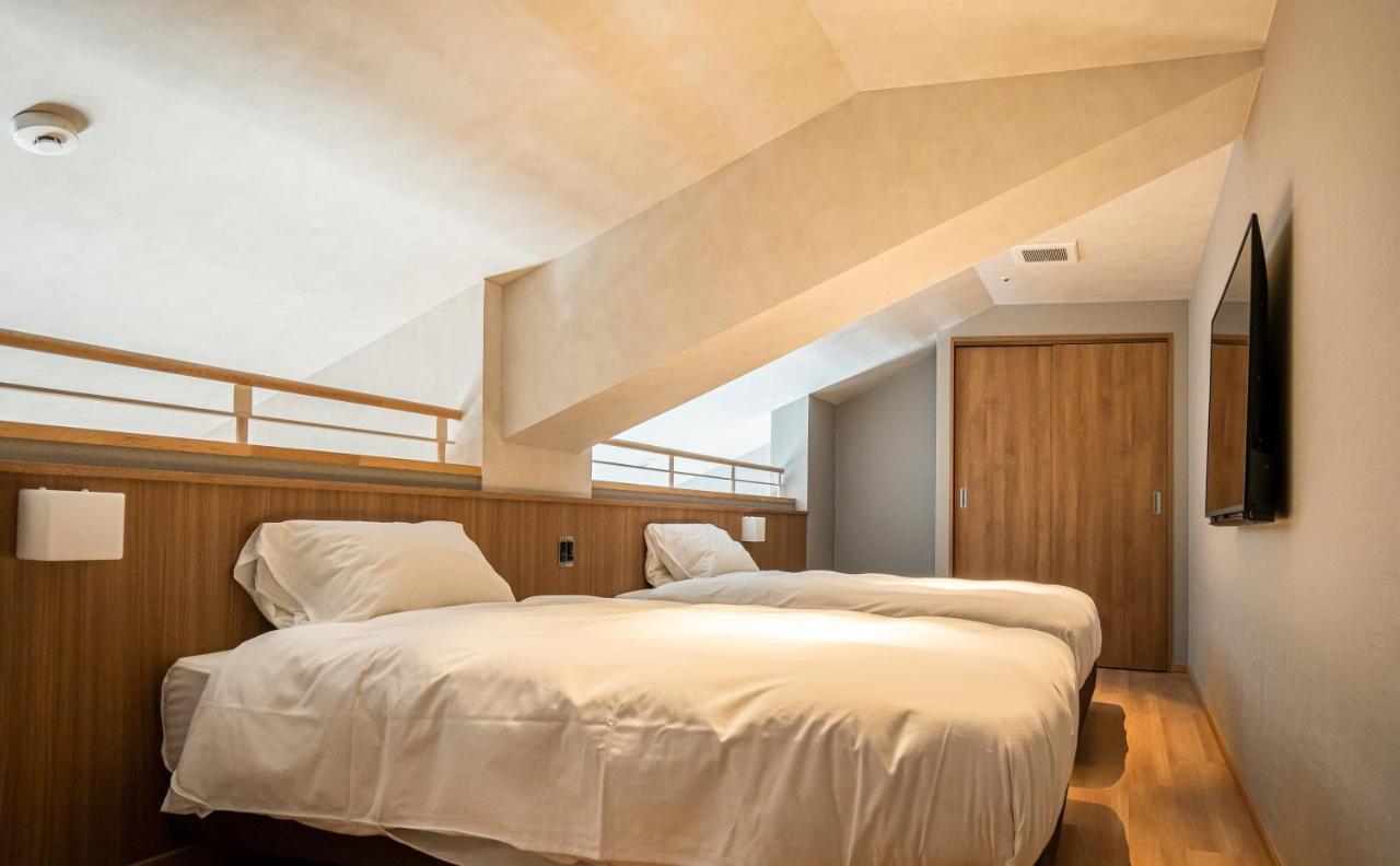 Higashikawa Asahidake Onsen Hotel Bear Monte Екстериор снимка